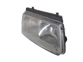 Volkswagen PASSAT B5 Lampa przednia 064411125R