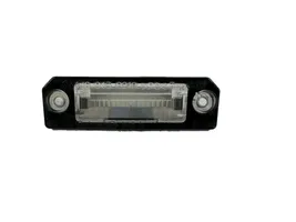 Audi A6 S6 C5 4B Lampa oświetlenia tylnej tablicy rejestracyjnej 1J6943021B