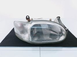 Ford Escort Lampa przednia 13K060AA