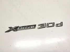 BMW X5 F15 Gamintojo ženkliukas/ modelio raidės 