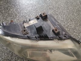 Chrysler Voyager Lampa przednia 04857710AB