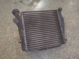 Volkswagen Touareg I Chłodnica powietrza doładowującego / Intercooler 