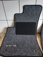 Hyundai Santa Fe Set di tappetini per auto E814526001