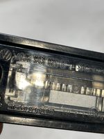 Volkswagen PASSAT CC Lampa oświetlenia tylnej tablicy rejestracyjnej 1J6943021B