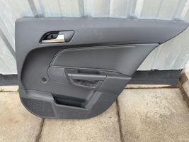 Opel Astra H Garniture panneau de porte arrière T110135