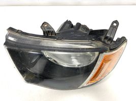 Mitsubishi L200 Lampa przednia 90736300