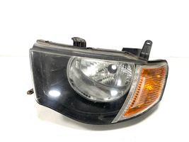 Mitsubishi L200 Lampa przednia 90736300