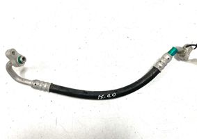 Hyundai ix20 Manguera/tubo del aire acondicionado (A/C) 000003