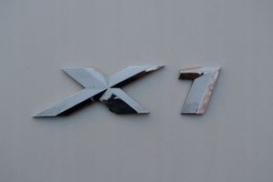 BMW X1 F48 F49 Gamintojo ženkliukas/ modelio raidės 