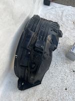 Nissan Navara Pare-boue passage de roue avant 63841-EB000