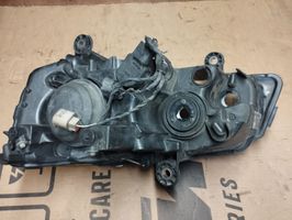 Chrysler Voyager Lampa przednia 05113342AD