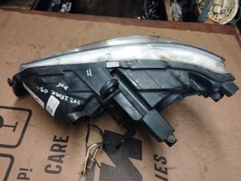 Chrysler Voyager Lampa przednia 05113342AF