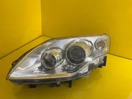Renault Laguna III Lampa przednia 26060040R