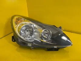 Opel Corsa D Lampa przednia 13217454