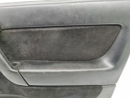 Opel Astra G Revestimiento de puerta delantera 024404558