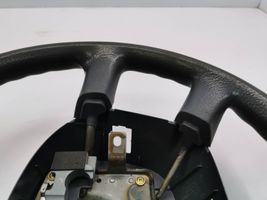 KIA Carens I Steering wheel 0K2FB32980