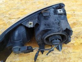 Dodge Caravan Lampa przednia 04857701ab