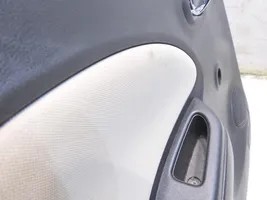 Nissan Micra Rivestimento del pannello della portiera posteriore 829231HA0A