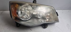 Chrysler Town & Country V Lampa przednia 05113336AE