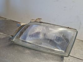 Toyota Carina T210 Lampa przednia E13021738