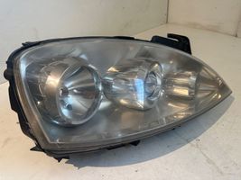 Opel Corsa C Lampy przednie / Komplet 13100536