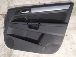 Opel Zafira B Revestimiento de puerta delantera 13223184