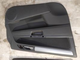 Opel Zafira B Revestimiento de puerta delantera 13223184