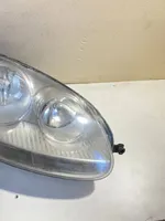 Volkswagen Golf V Lampa przednia 1K6941006P