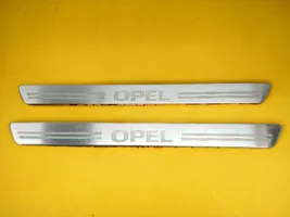 Opel Insignia A Rivestimento vano piedi laterale 