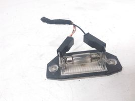 Ford Mondeo Mk III Lampa oświetlenia tylnej tablicy rejestracyjnej 1S7113550AC