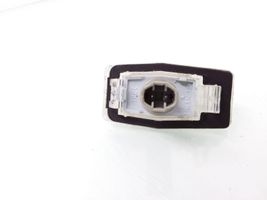 Mazda 323 F Lampa oświetlenia tylnej tablicy rejestracyjnej 0384