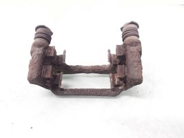 Toyota Avensis T250 Supporto della pinza del freno posteriore 0204Y01338