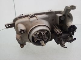 Nissan Micra Lampa przednia 91076