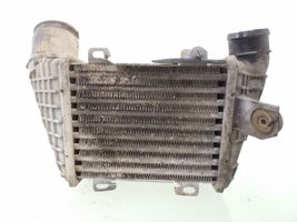 Volkswagen Golf III Chłodnica powietrza doładowującego / Intercooler 1H0145805