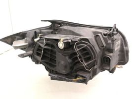 BMW 1 E81 E87 Lampa przednia 7249649