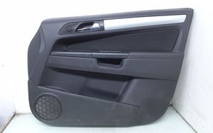 Opel Zafira B Front door card panel trim 8641390