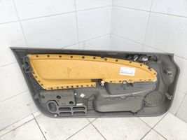 Opel Corsa D Garniture de panneau carte de porte avant 13232891