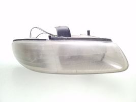 Chrysler Voyager Lampa przednia 04897388AC