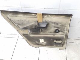 Volkswagen PASSAT B2 Rivestimento del pannello della portiera posteriore 323867172a