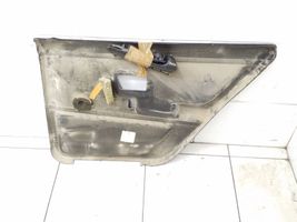 Volkswagen PASSAT B2 Takaoven verhoilu 323867211