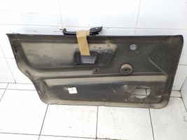 Volkswagen PASSAT B2 Front door card panel trim 323867011q