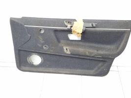 Volkswagen PASSAT B2 Front door card panel trim 323867011q