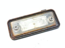 Audi A6 S6 C4 4A Lampa oświetlenia tylnej tablicy rejestracyjnej 1T0827634