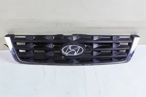 Hyundai Accent Maskownica / Grill / Atrapa górna chłodnicy 8636125620