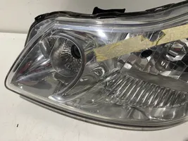 Suzuki SX4 Lampa przednia 10016684