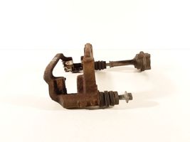 Opel Astra J Supporto della pinza del freno posteriore 063