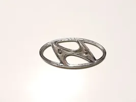 Hyundai Tucson JM Valmistajan merkki/logo/tunnus 