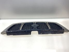 Subaru Forester SF Maskownica / Grill / Atrapa górna chłodnicy 91065FC