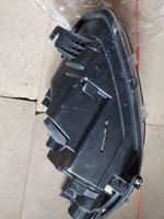 Ford Courier Lampa przednia ET7613W030AM