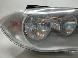 BMW 1 E81 E87 Lampa przednia 7249652